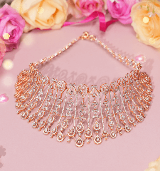 Designer diamond necklace in gold with intricate teardrop pattern for bridal wear
