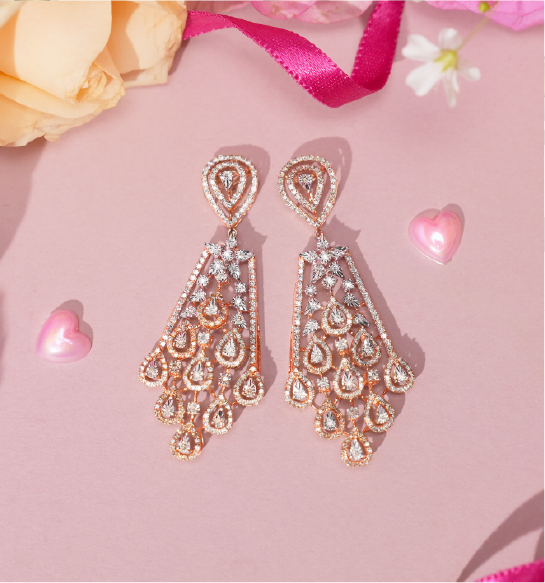 Luxury diamond drop earrings in gold with intricate teardrop design for women