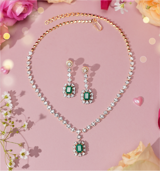 Luxury emerald and diamond necklace set with matching earrings in gold for bridal wear